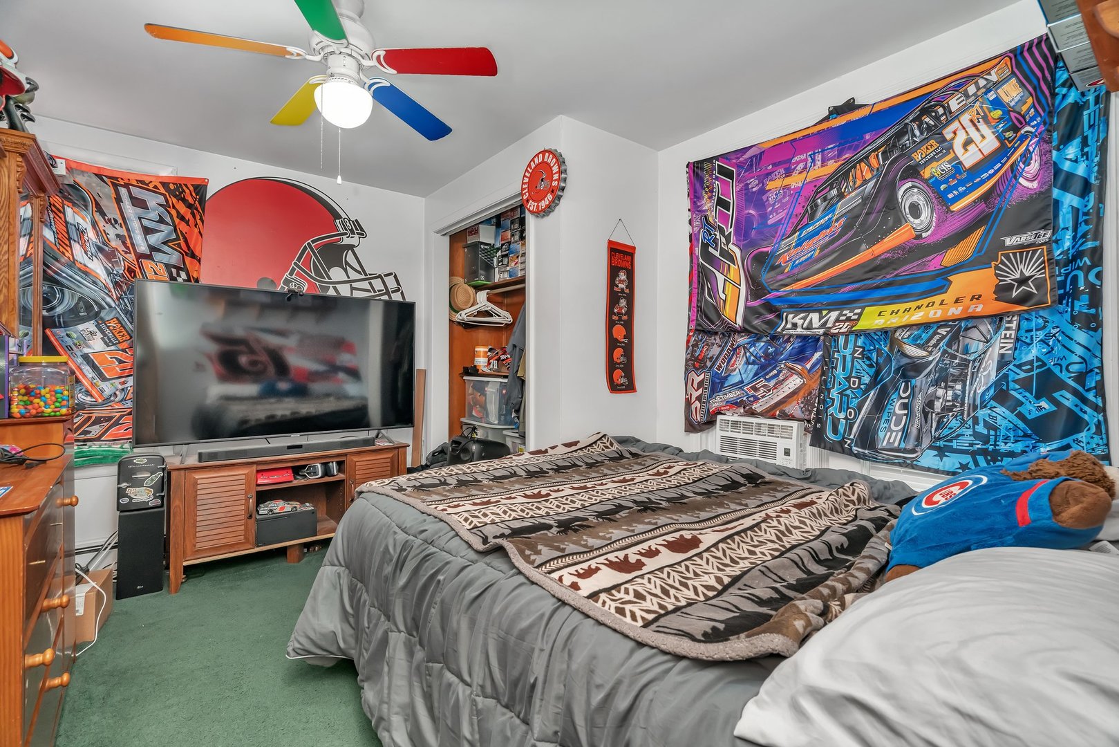 107 North Elm Street Gardner, IL 60424 - Photo 30 of 40 a bedroom with a bed and a flat screen tv