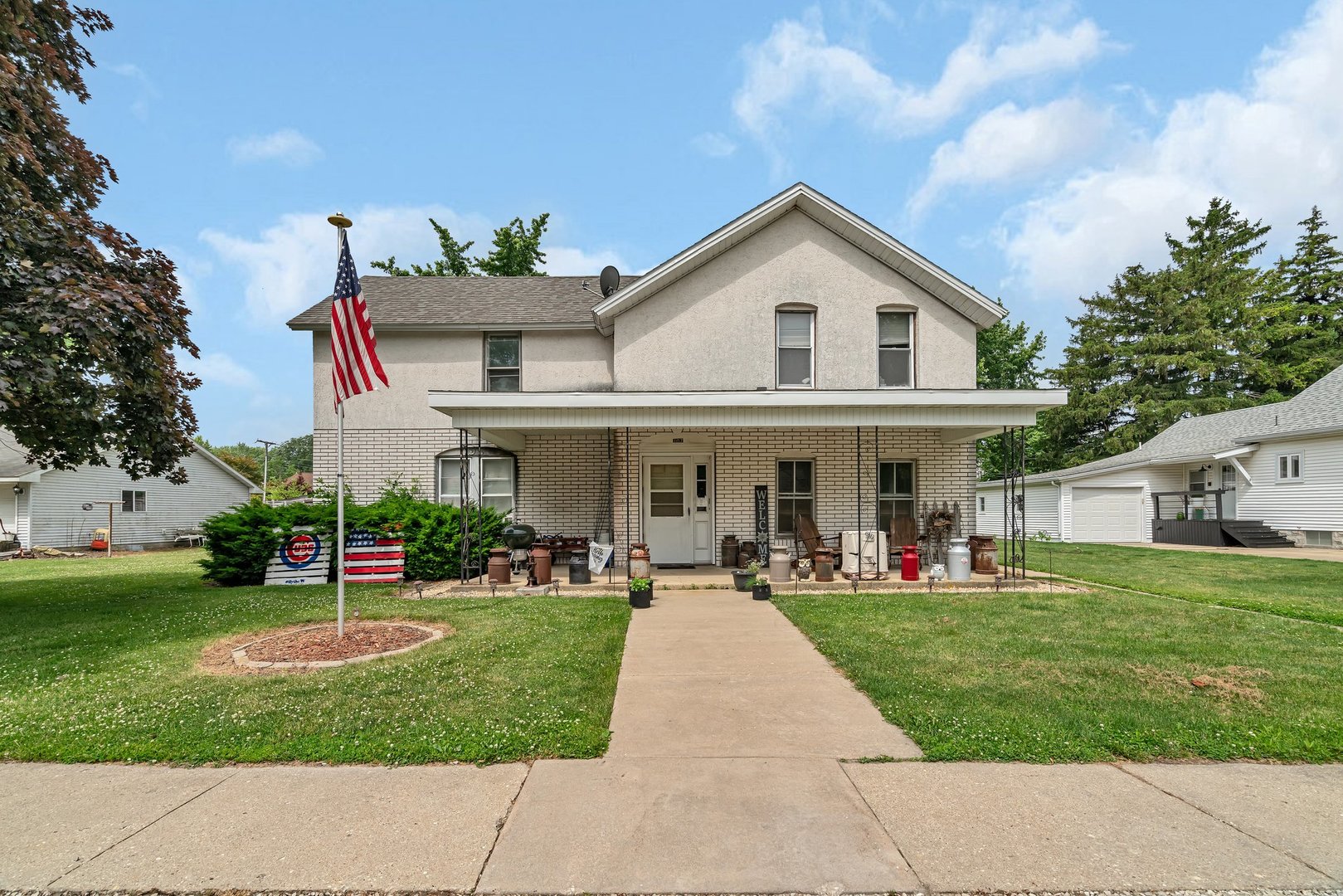 107 North Elm Street Gardner, IL 60424 - Photo 40 of 40 a front view of house with yard and green space