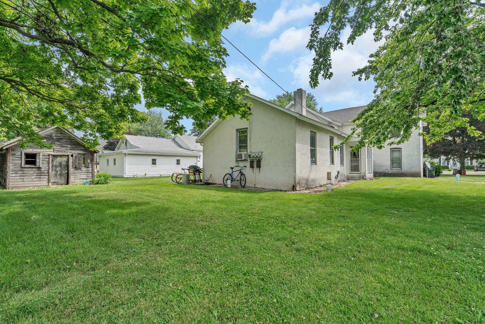 107 North Elm Street Gardner, IL 60424 - Photo 7 of 40 a view of a house with backyard and garden