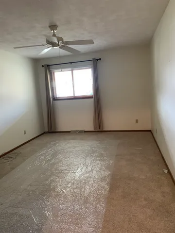 a kitchen with a sink stainless steel appliances and cabinets