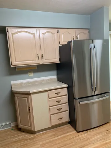 a view of an empty room with stairs