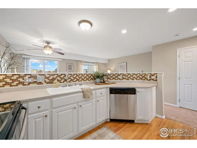 a spacious bathroom with a sink a mirror and a bathtub