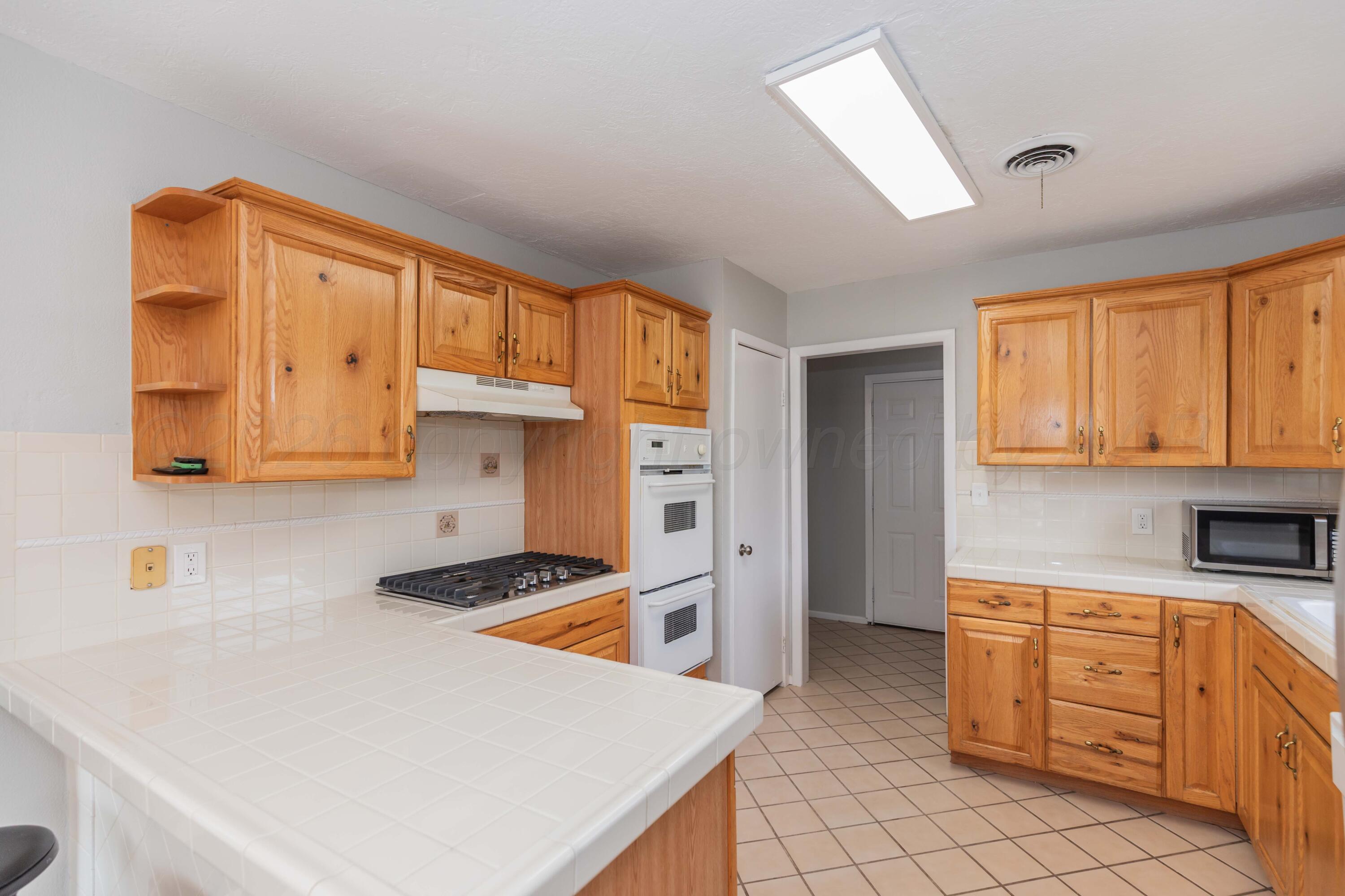 2710 Emory Drive Amarillo, TX 79110 - Photo 7 of 34 KITCHEN VIEW 3