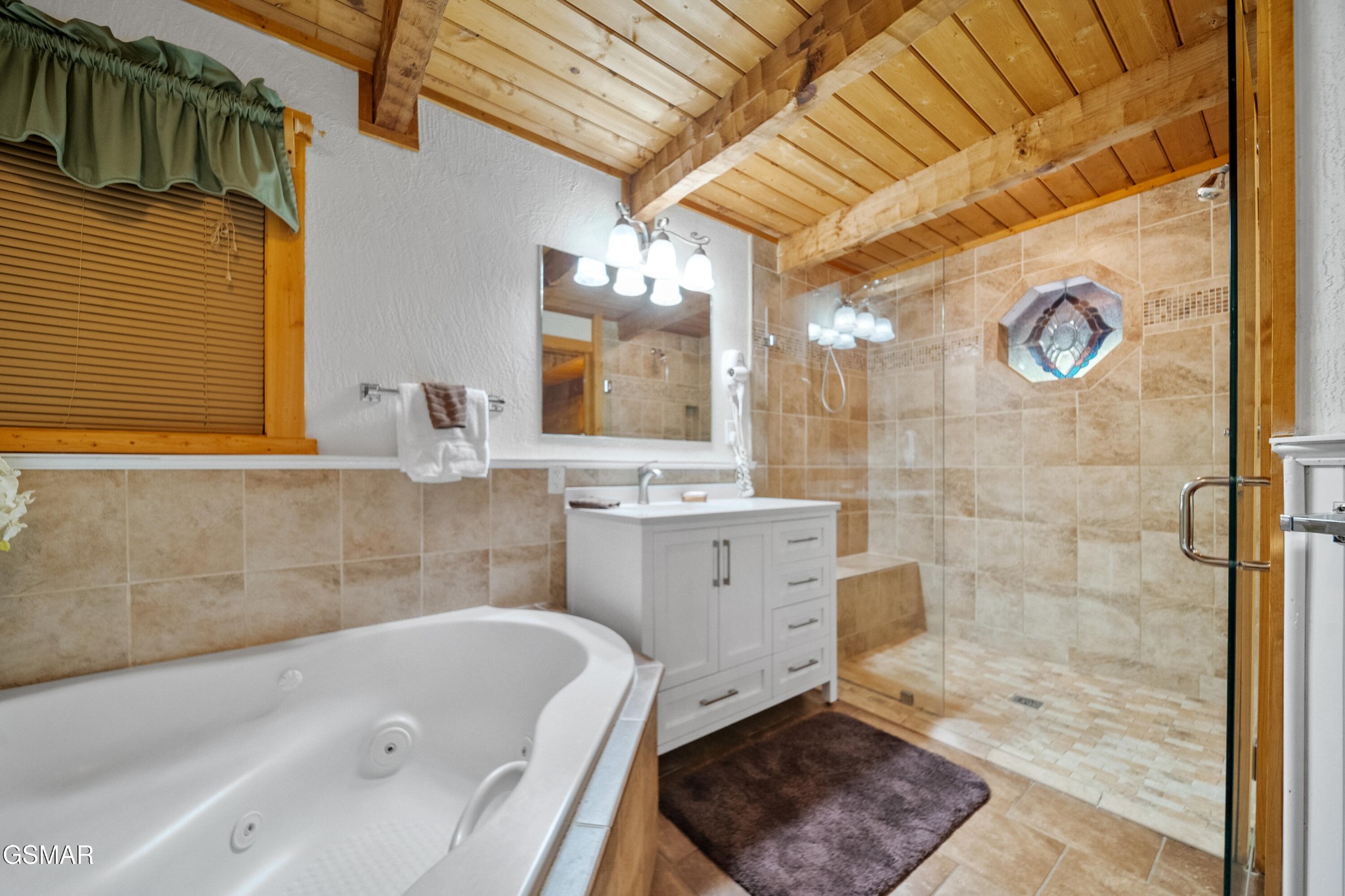 1732 Ridgecrest Drive Sevierville, TN 37876 - Photo 13 of 28 a bathroom with a tub a sink and a shower