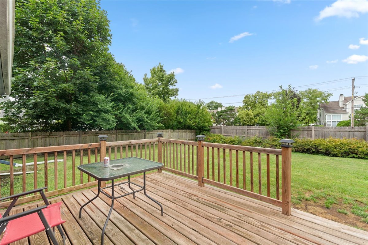 1011 Aspen Drive Buffalo Grove, IL 60089 - Photo 16 of 19 a view of balcony with wooden floor and outdoor seating