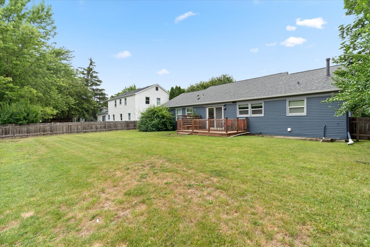 1011 Aspen Drive Buffalo Grove, IL 60089 - Photo 17 of 19 a view of a house with a backyard
