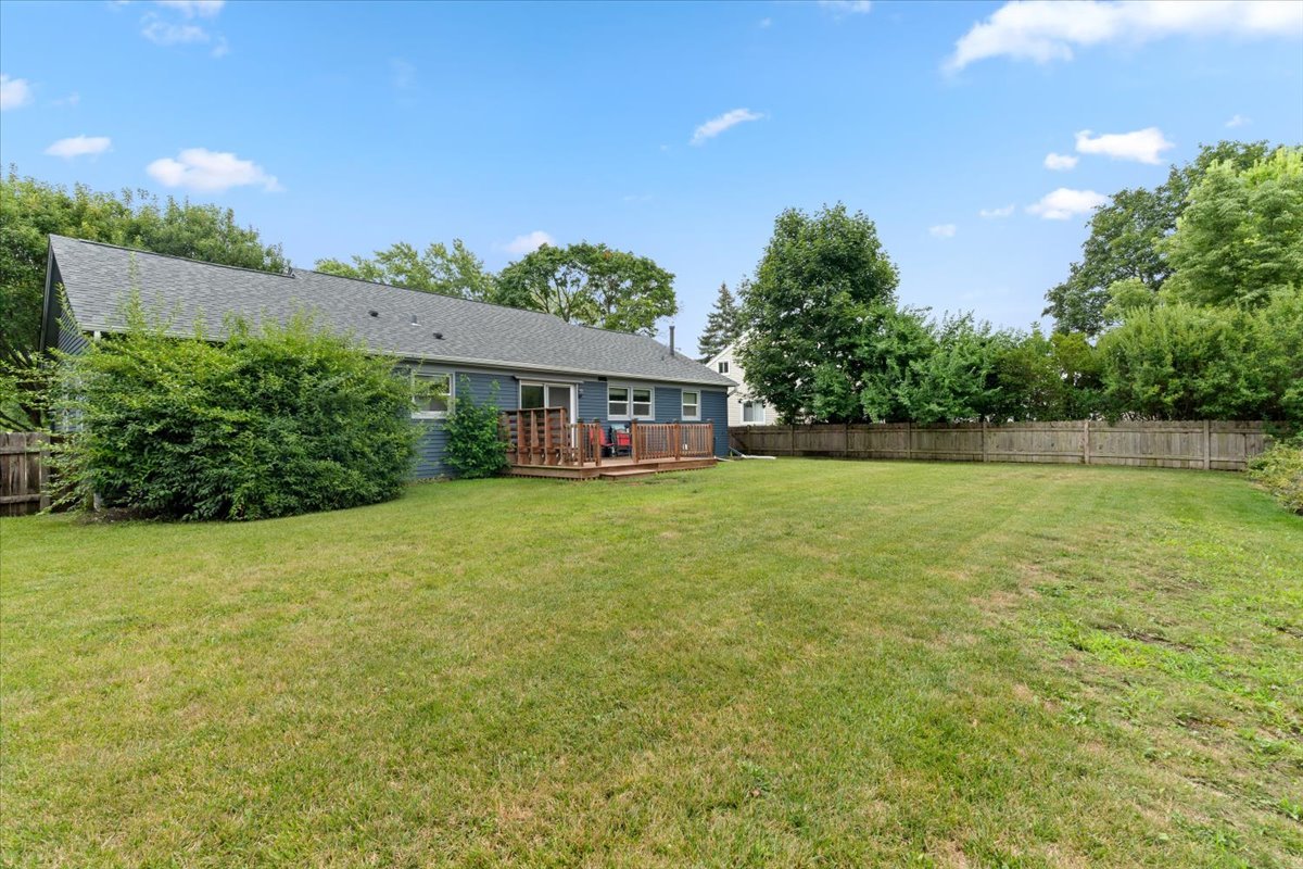 1011 Aspen Drive Buffalo Grove, IL 60089 - Photo 19 of 19 a view of a house with a garden and lake view