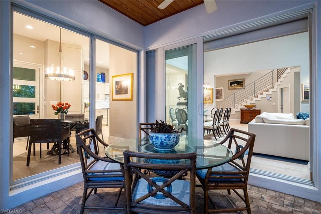 367 5th Avenue North Naples, FL 34102 - Photo 30 of 48 covered lanai dining
