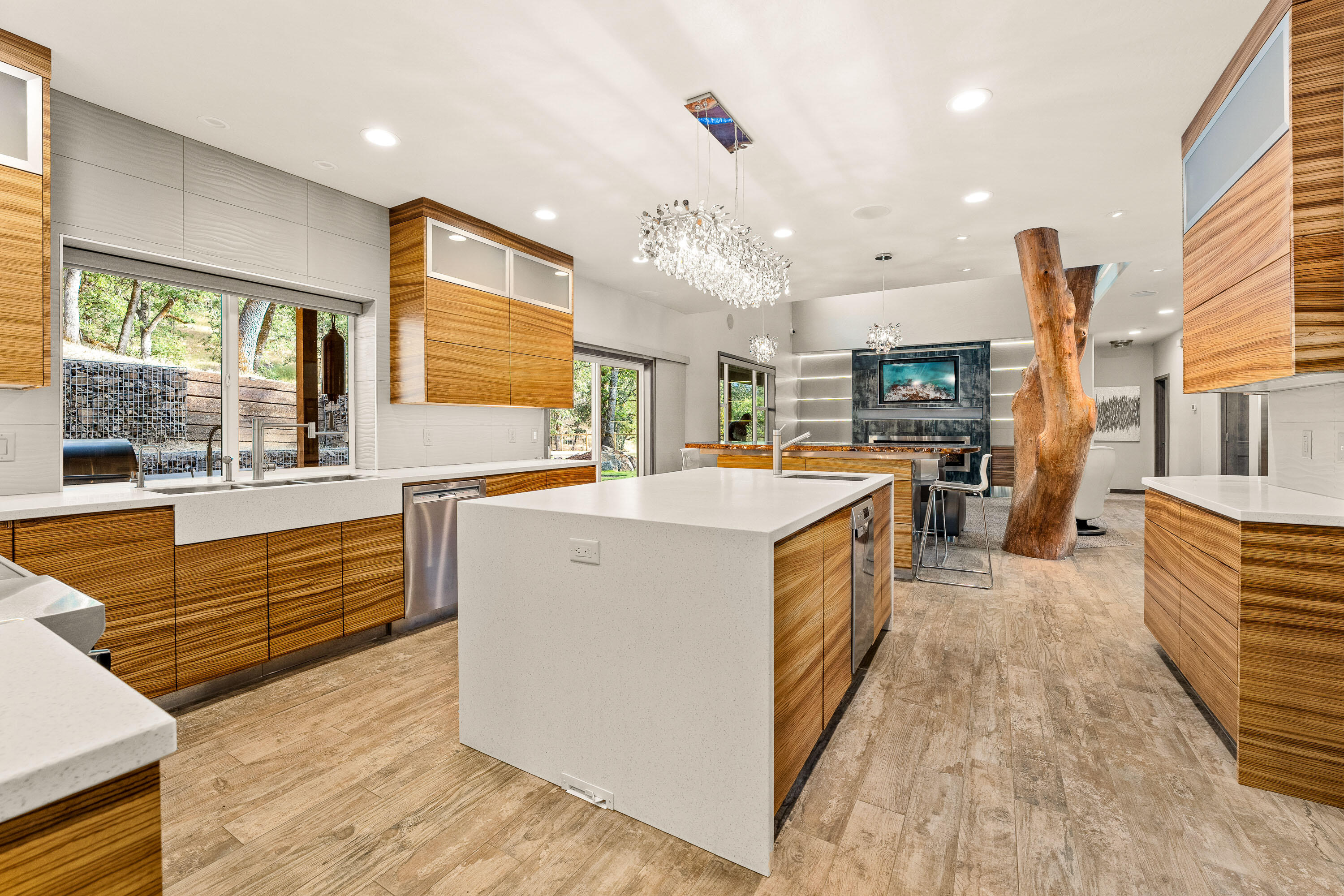 182 Wards Creek Road Rogue River, OR 97537 - Photo 6 of 80 a kitchen with stainless steel appliances kitchen island granite countertop a stove and a sink