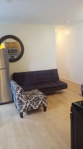 a wooden bench sitting in a room