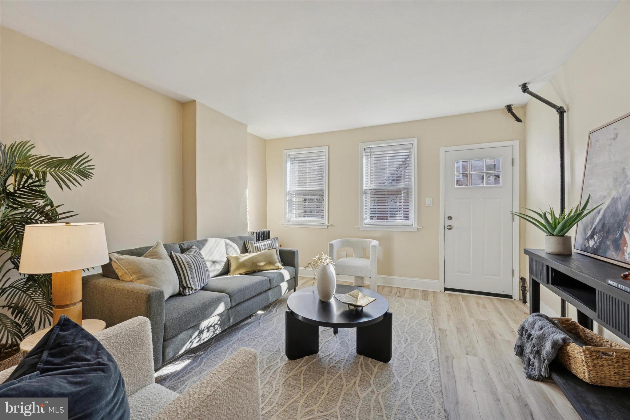 837 Almond Street Philadelphia, PA 19125 - Photo 3 of 24 a living room with furniture and wooden floor