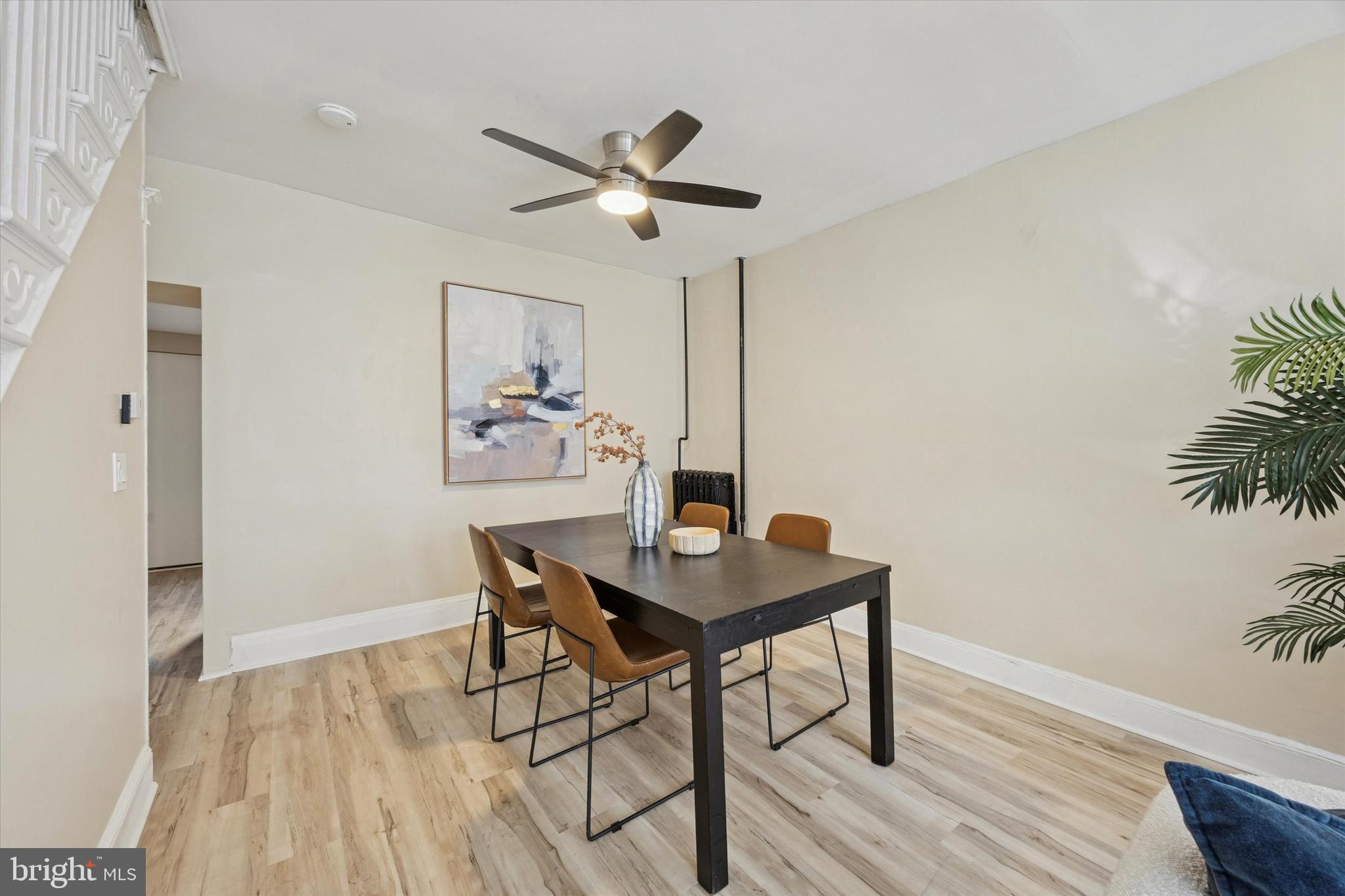 837 Almond Street Philadelphia, PA 19125 - Photo 8 of 24 a view of a workspace with furniture and wooden floor