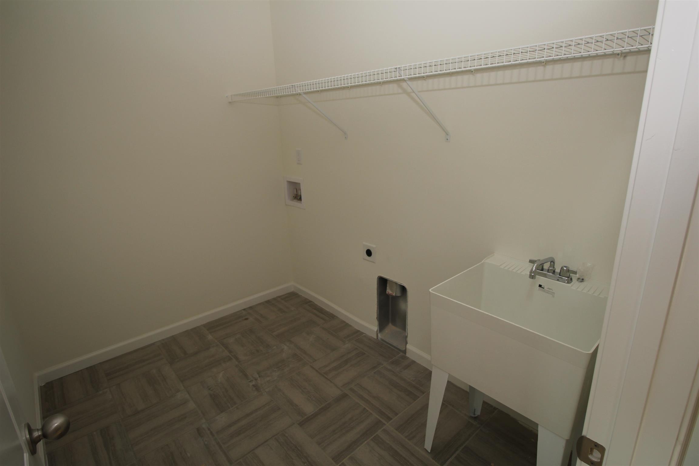 305 Buckadee Road La Vergne, TN 37086 - Photo 14 of 23 LAUNDRY WITH MID SINK