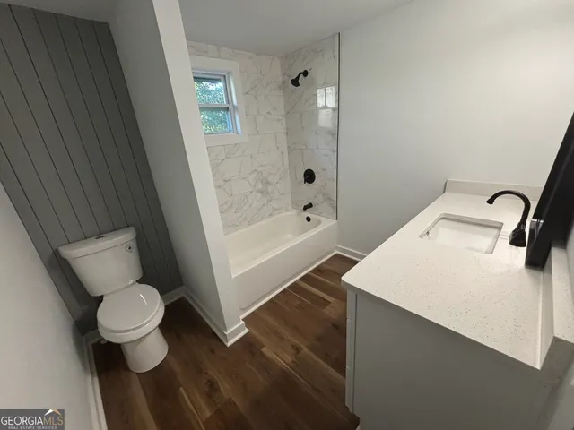 a bathroom with a sink and a toilet