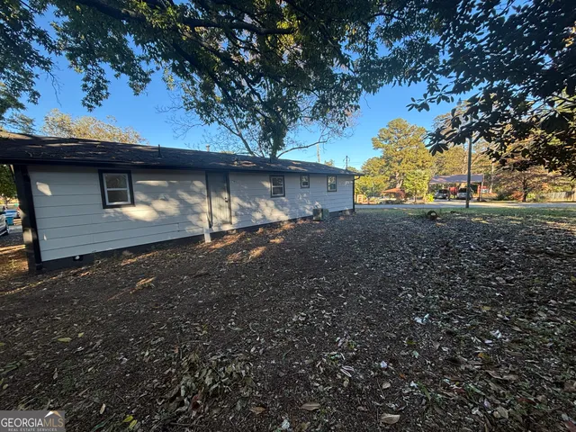 a front view of a house with yard