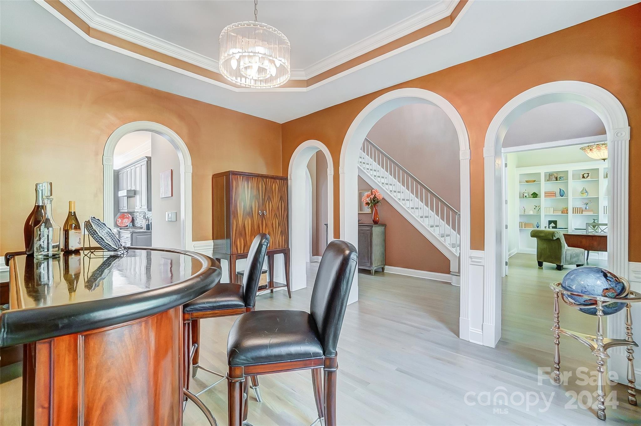 922 Cove Point Lane Tega Cay, SC 29708 - Photo 20 of 48 a view of living room and chandelier