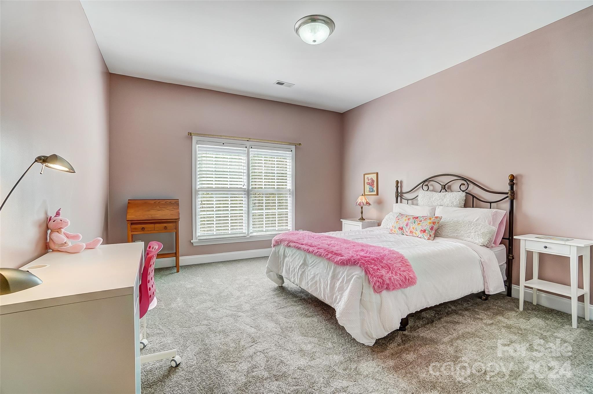 922 Cove Point Lane Tega Cay, SC 29708 - Photo 26 of 48 a bed room with a bed and a chair