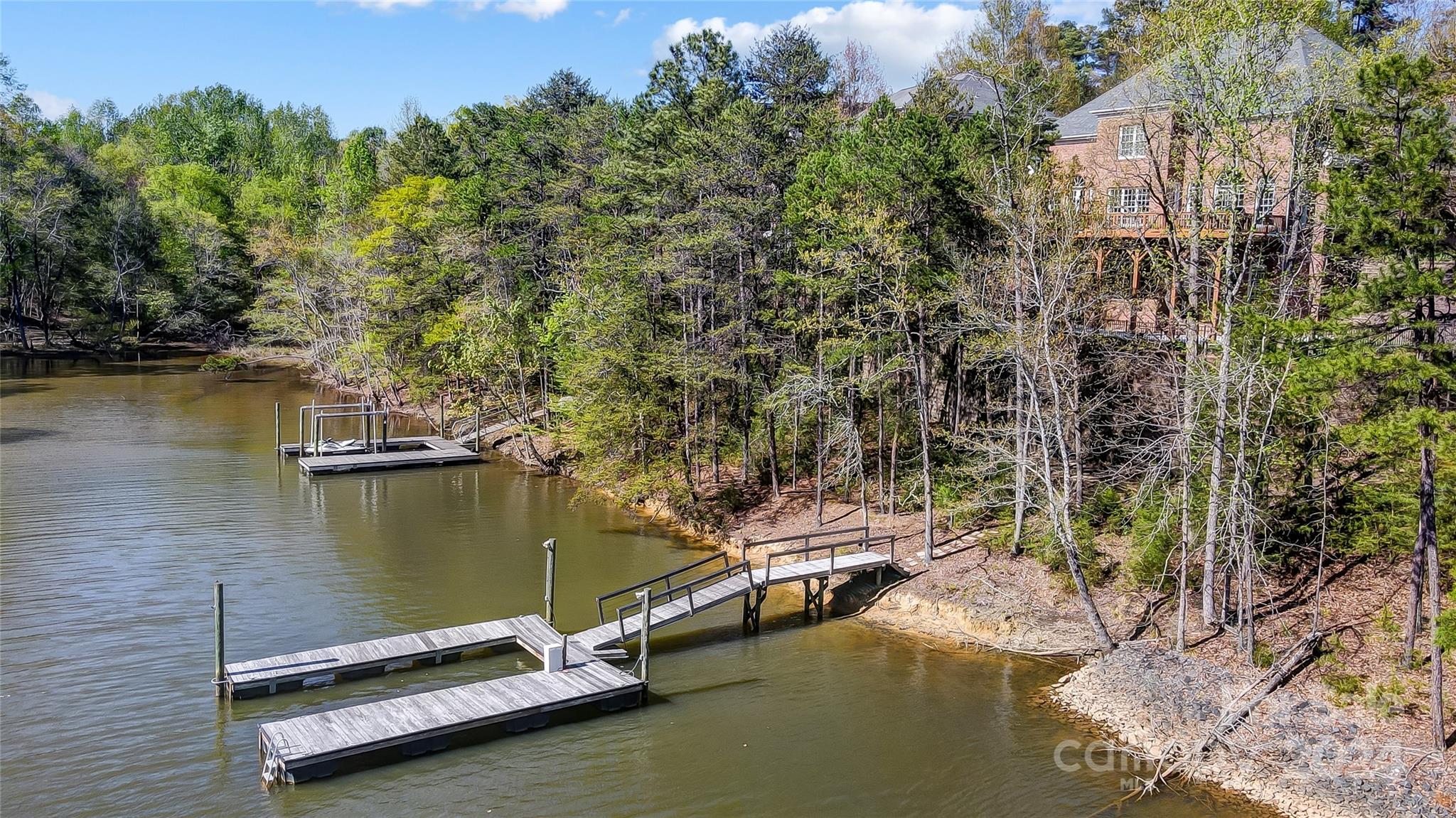 922 Cove Point Lane Tega Cay, SC 29708 - Photo 3 of 48 an aerial view of a house with a lake view