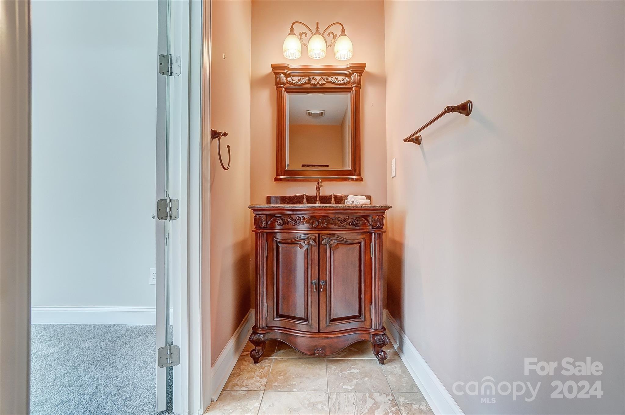 922 Cove Point Lane Tega Cay, SC 29708 - Photo 38 of 48 a view of a hallway with washer and dryer
