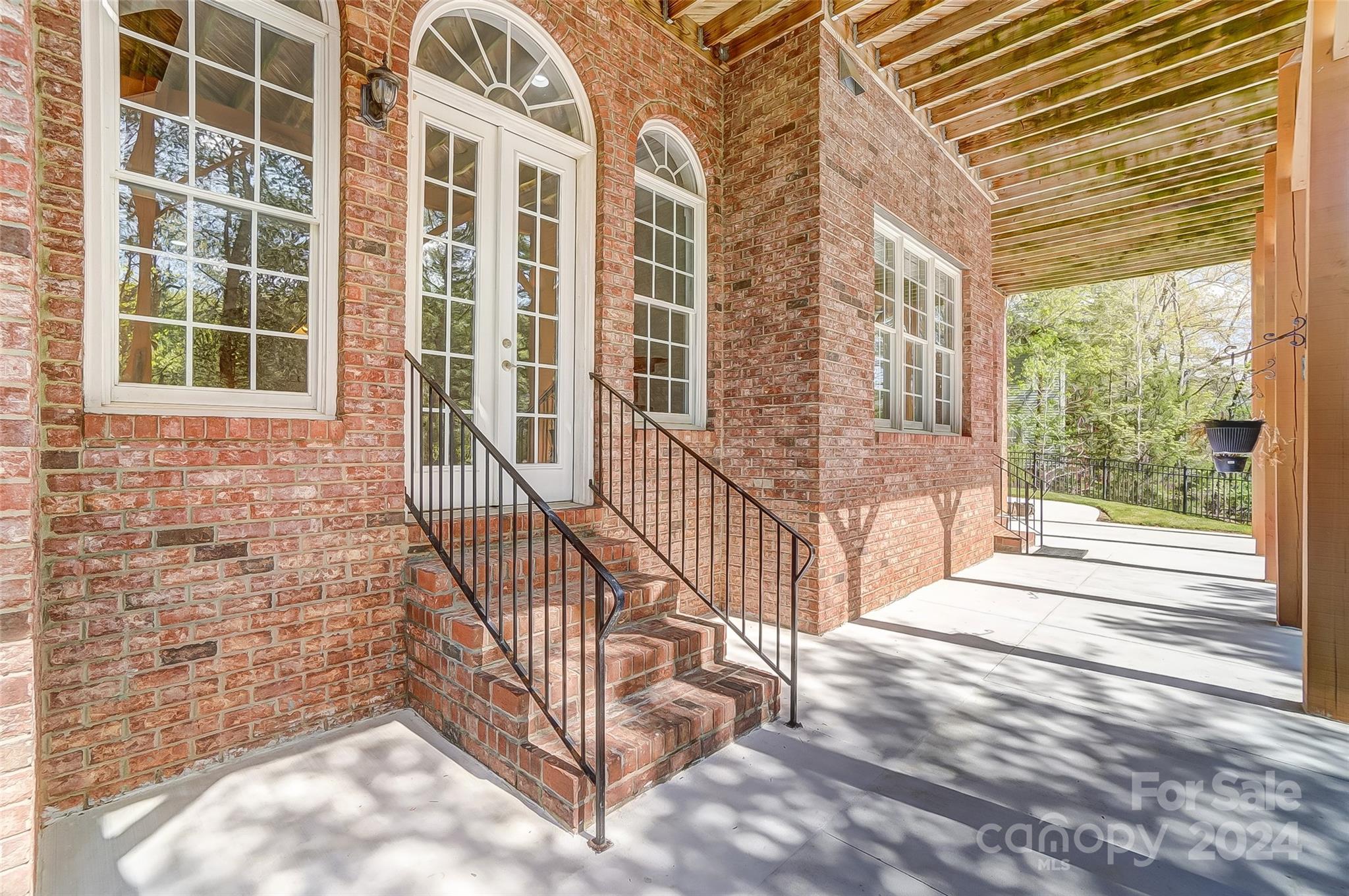 922 Cove Point Lane Tega Cay, SC 29708 - Photo 45 of 48 a view of a balcony with a large window