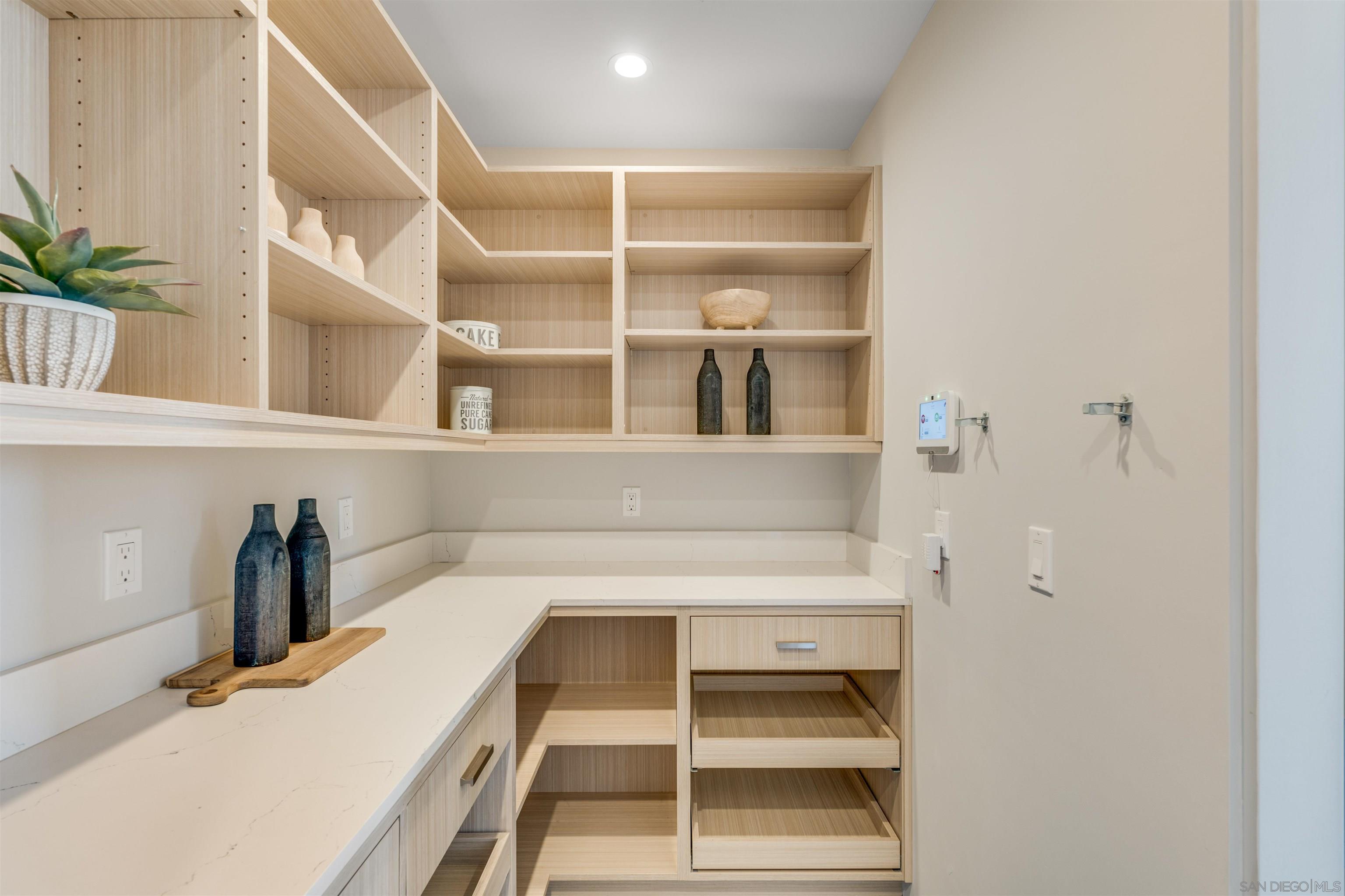 320 11th Street Del Mar, CA 92014 - Photo 12 of 45 a view of a room with rack on the wall