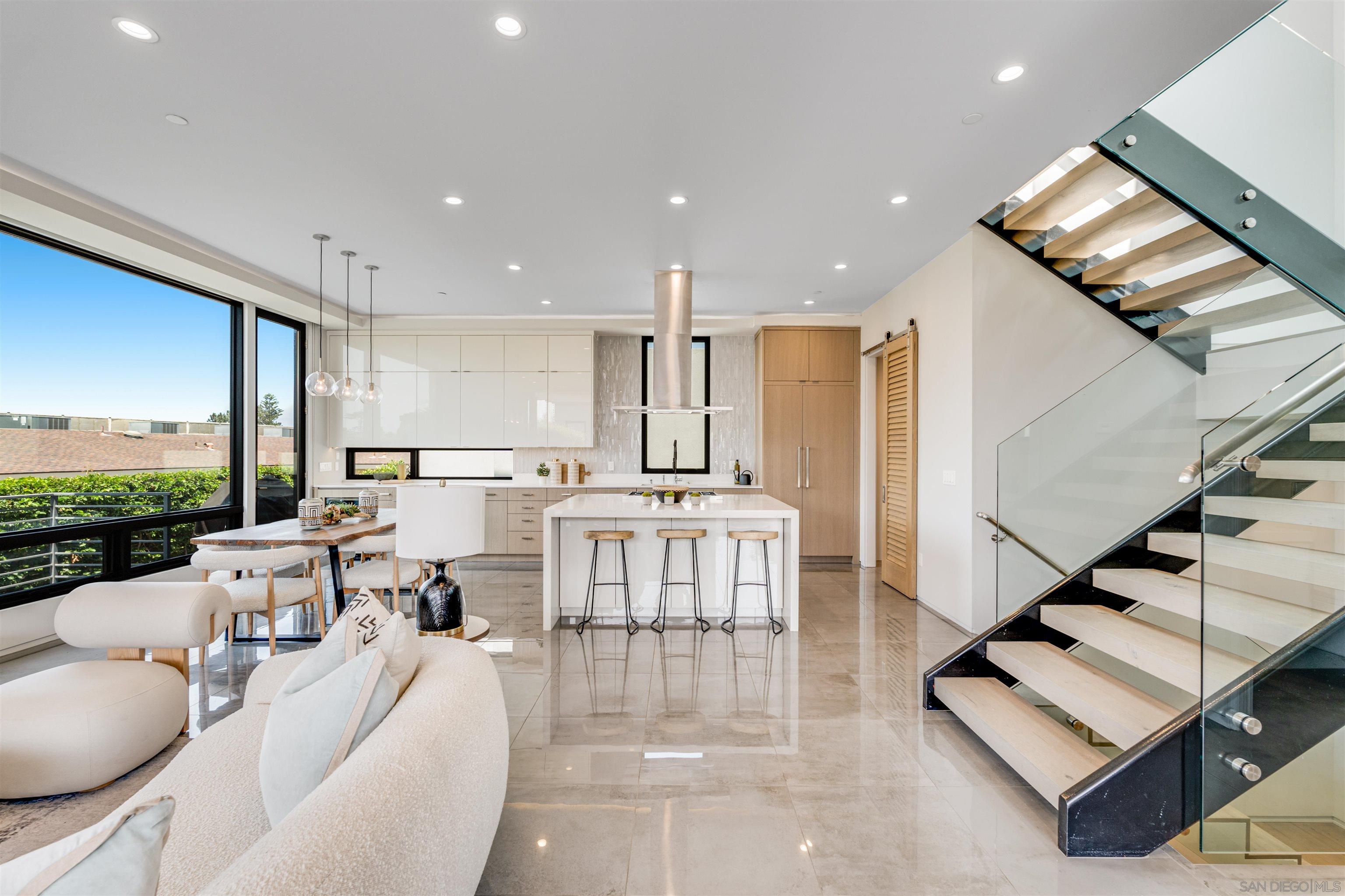 320 11th Street Del Mar, CA 92014 - Photo 2 of 45 a living room with furniture and a table