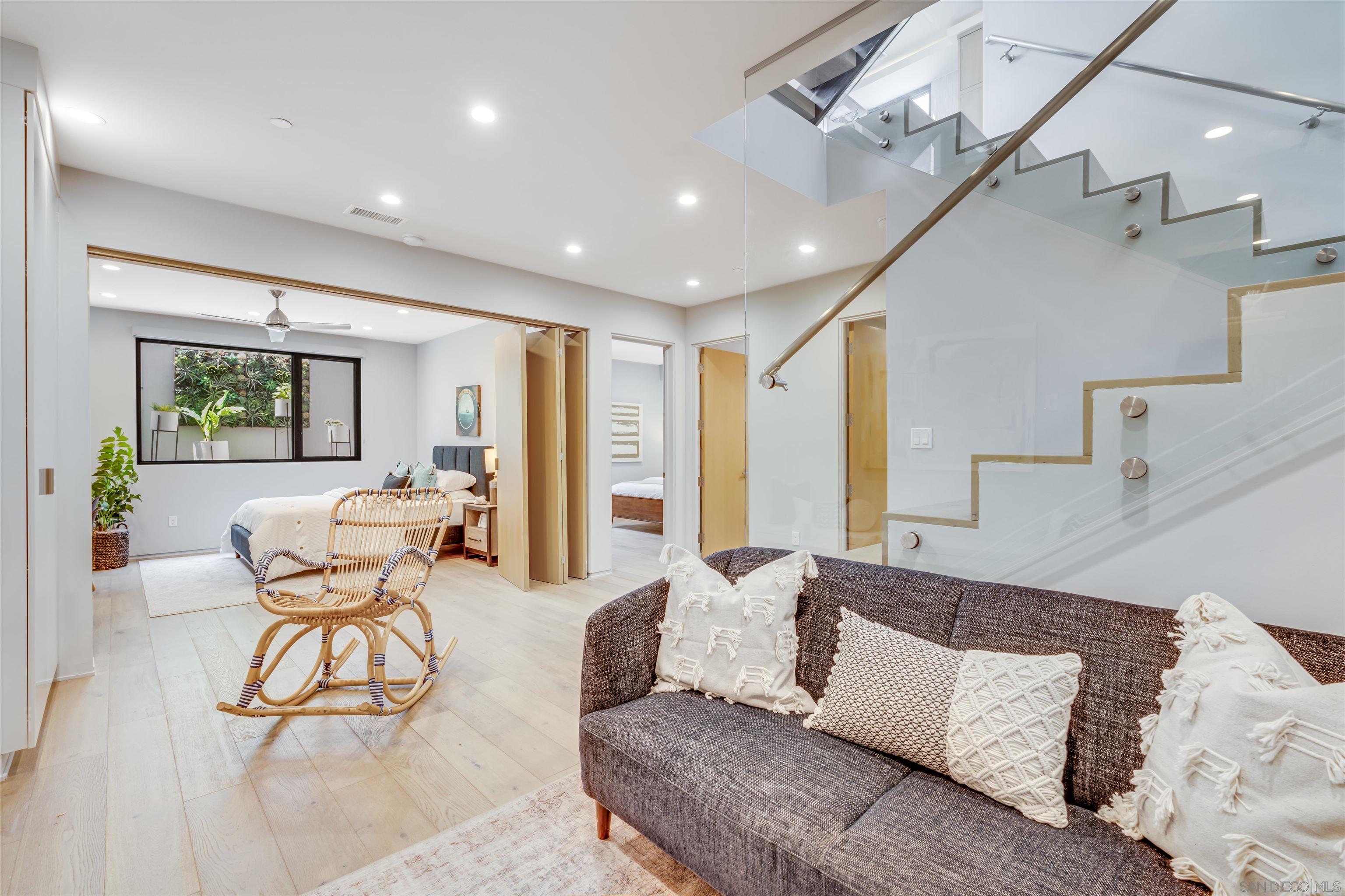 320 11th Street Del Mar, CA 92014 - Photo 25 of 45 a living room with furniture and wooden floor