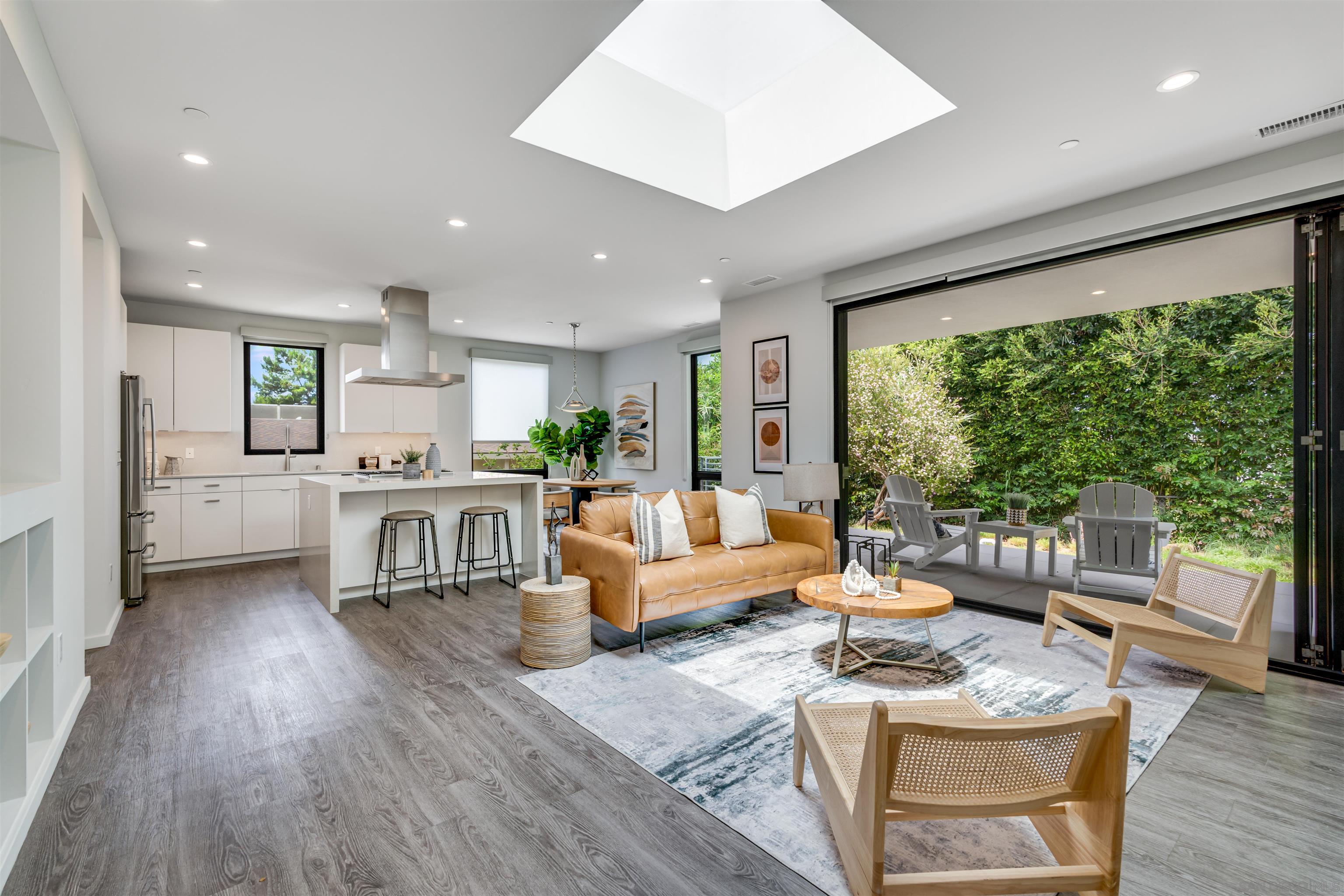 320 11th Street Del Mar, CA 92014 - Photo 31 of 45 a living room with furniture and a large window