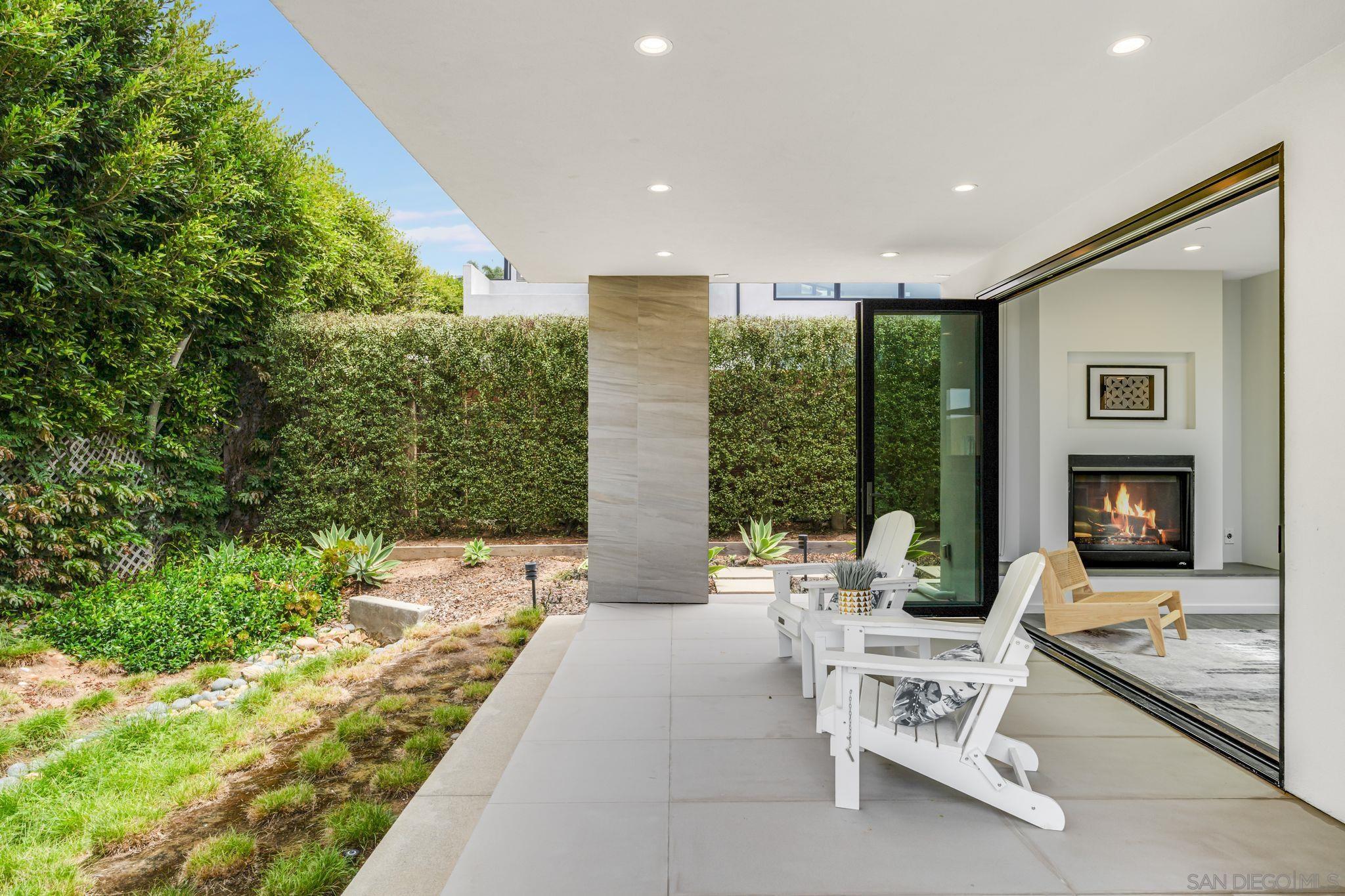 320 11th Street Del Mar, CA 92014 - Photo 33 of 45 a building outdoor space with patio furniture and potted plants