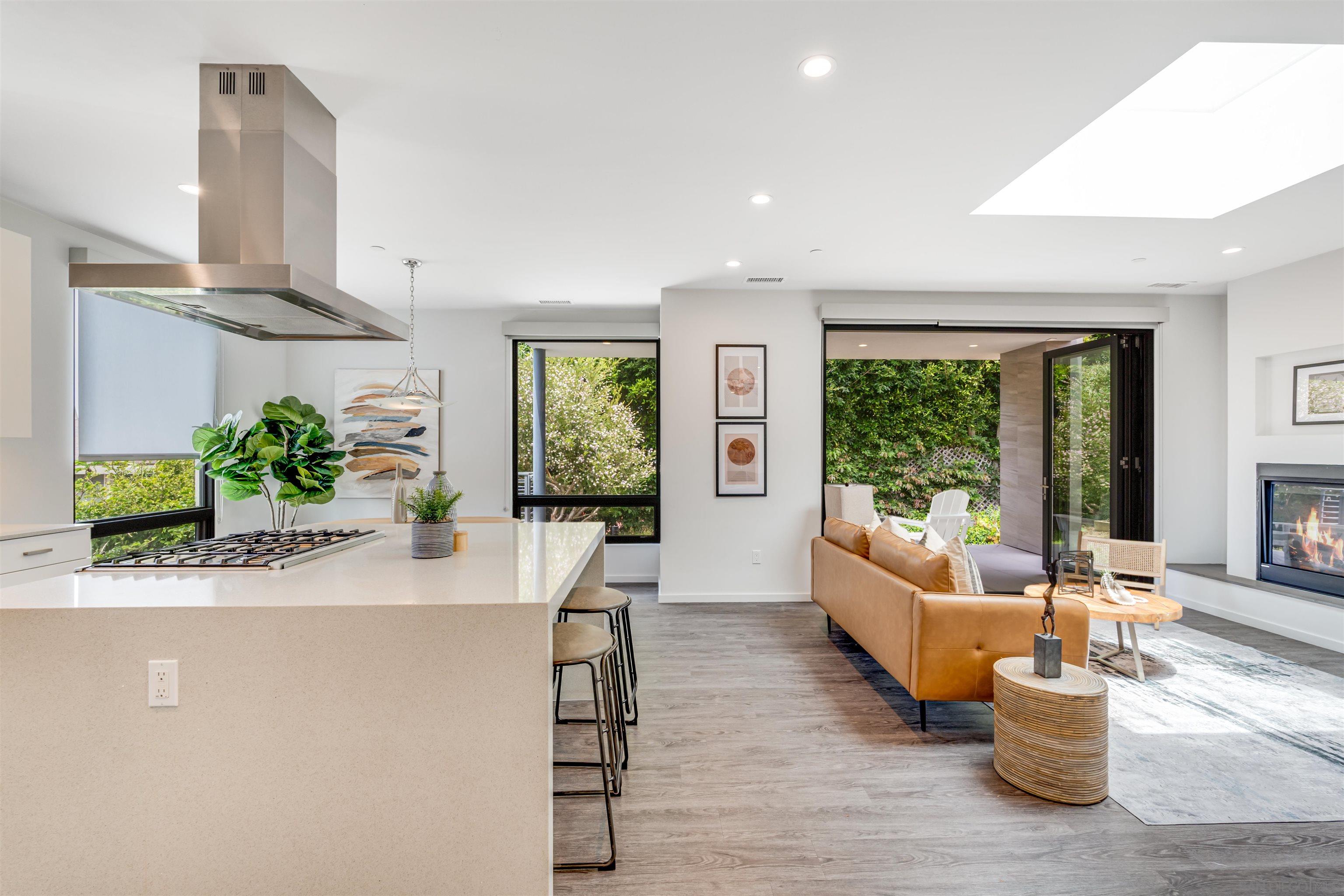 320 11th Street Del Mar, CA 92014 - Photo 36 of 45 a living room with furniture and a large window