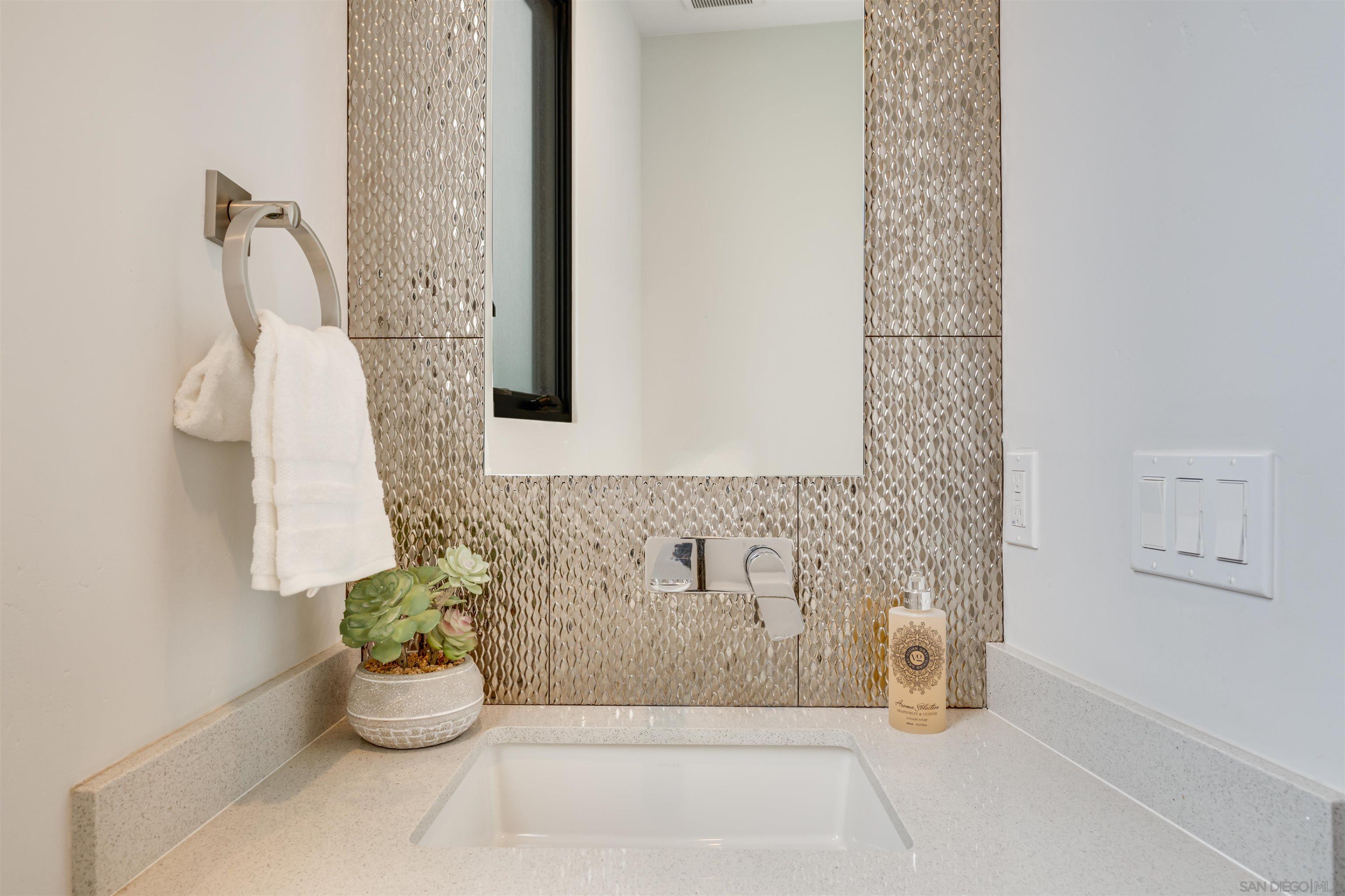 320 11th Street Del Mar, CA 92014 - Photo 37 of 45 a bathroom with a bathtub and shower