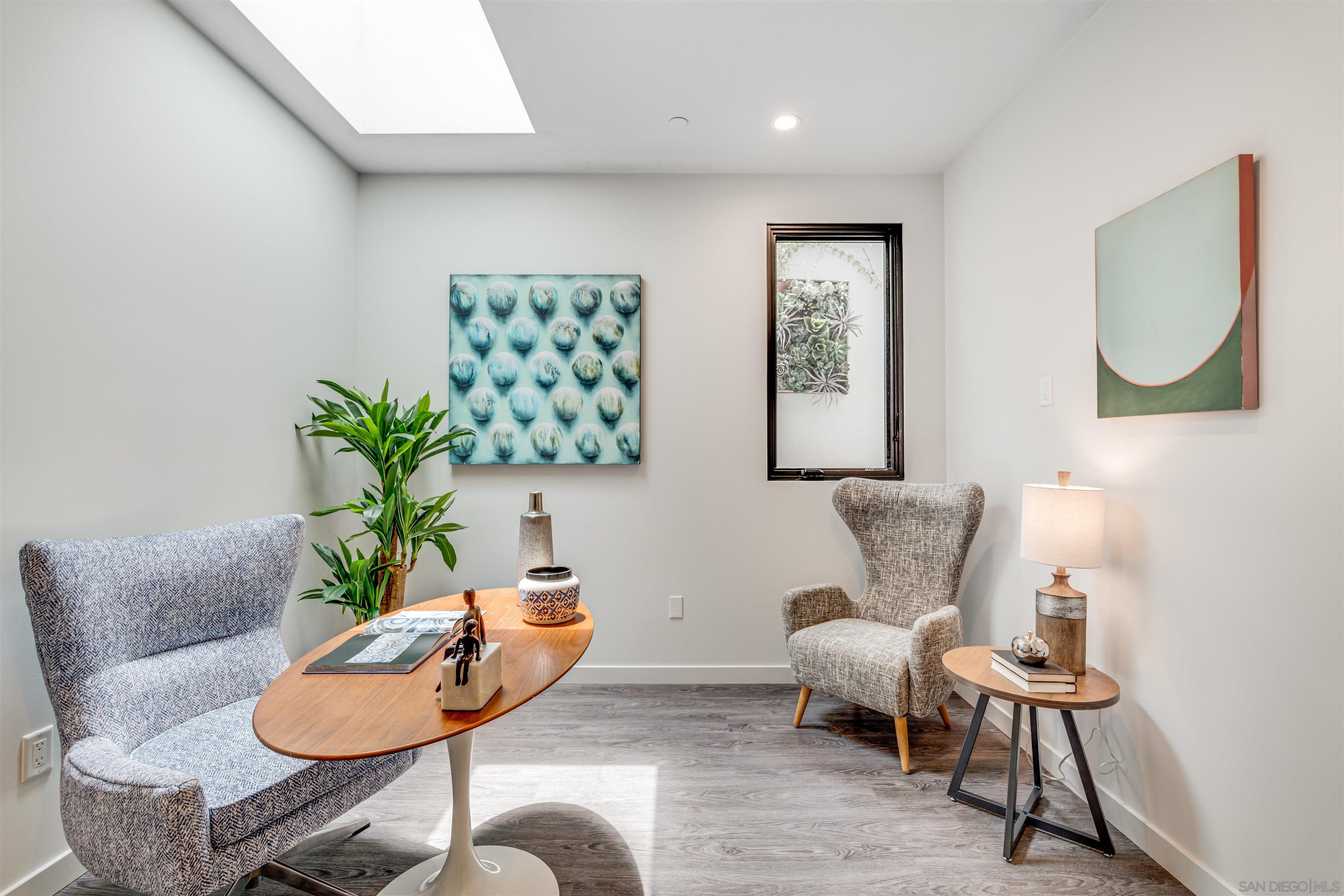 320 11th Street Del Mar, CA 92014 - Photo 38 of 45 a living room with furniture and a potted plant