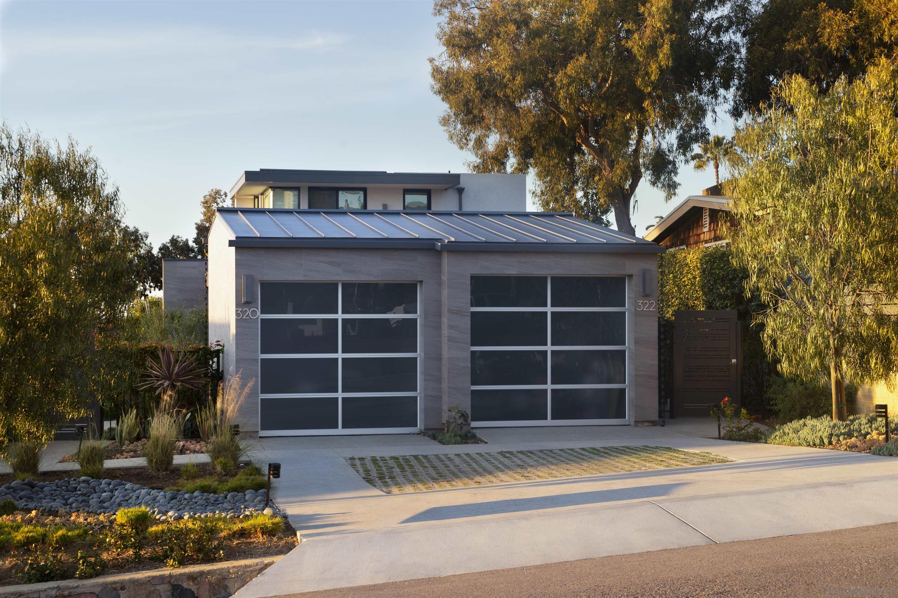 320 11th Street Del Mar, CA 92014 - Photo 44 of 45 a front view of a house with a yard and garage