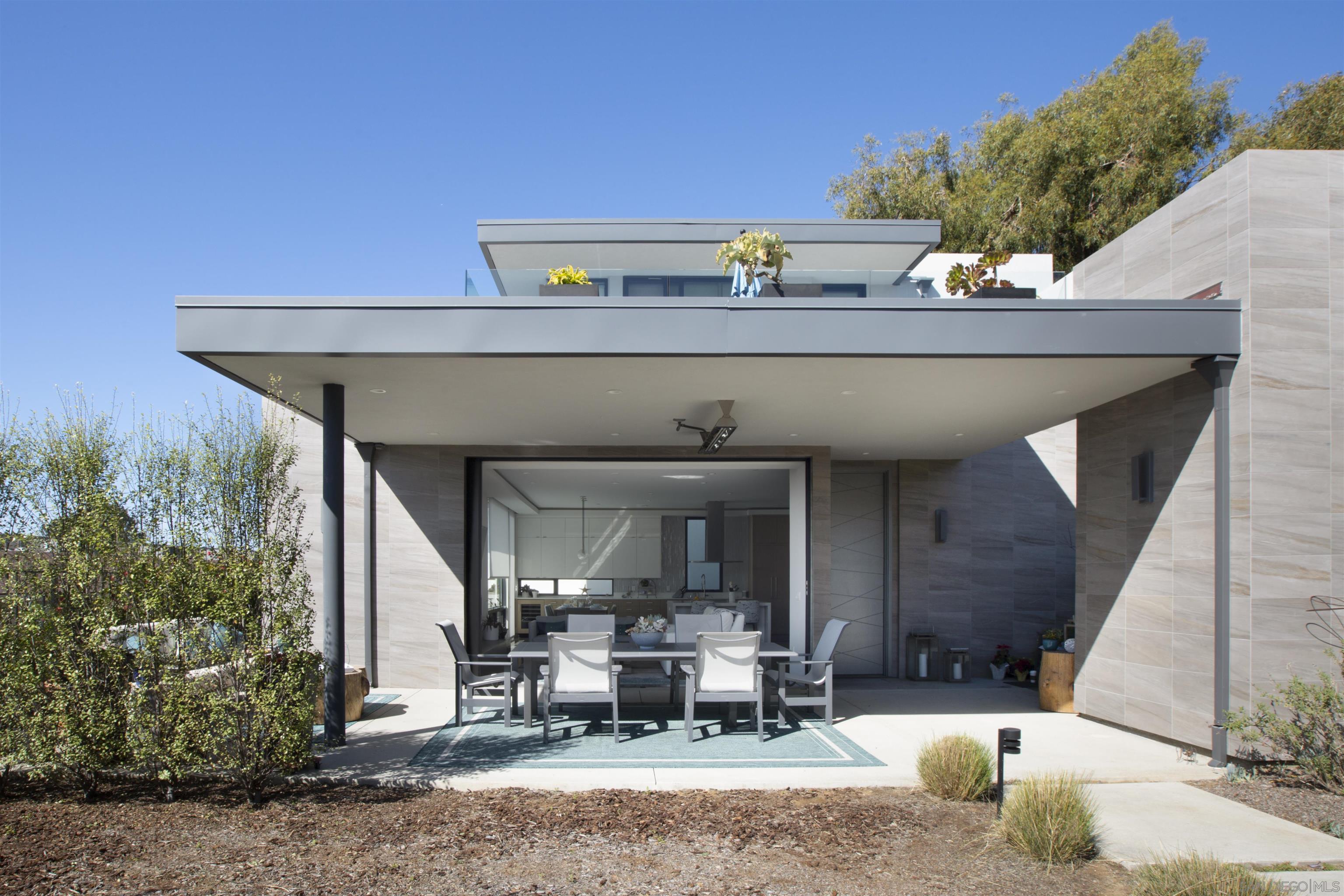 320 11th Street Del Mar, CA 92014 - Photo 5 of 45 a front view of a house with sitting area