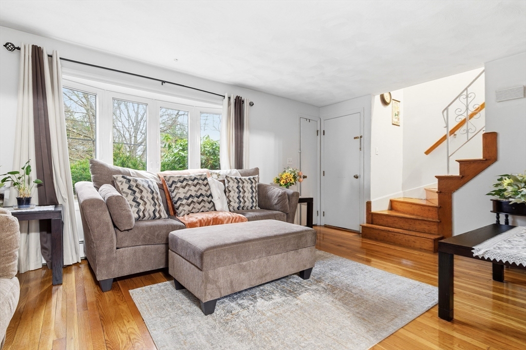 19 Clark Street Randolph, MA 02368 - Photo 25 of 30 a living room with furniture and a large window
