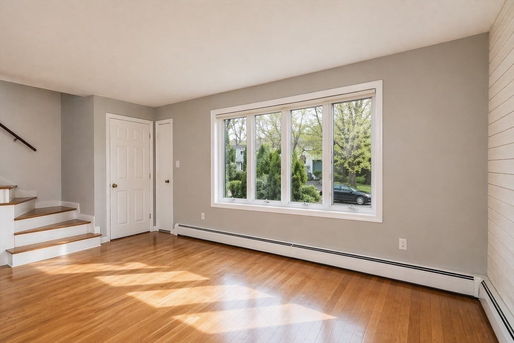 19 Clark Street Randolph, MA 02368 - Photo 8 of 30 a view of an empty room with a window
