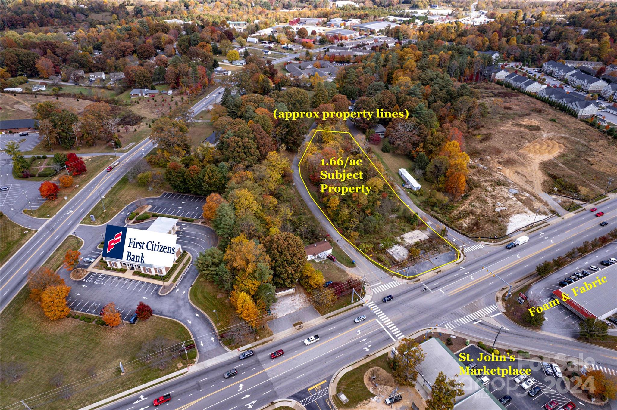 3008 Hendersonville Road Fletcher, NC 28732 - Photo 3 of 5 an aerial view of a house with a garden