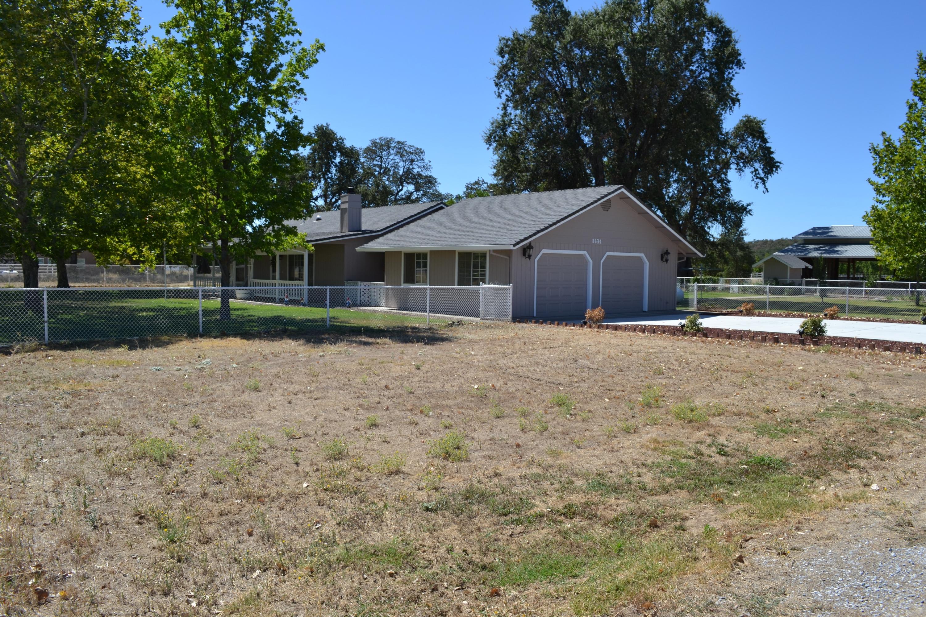 8634 Deschutes Road Palo Cedro, CA 96073 - Photo 22 of 24 Garage/cement parking was recently done