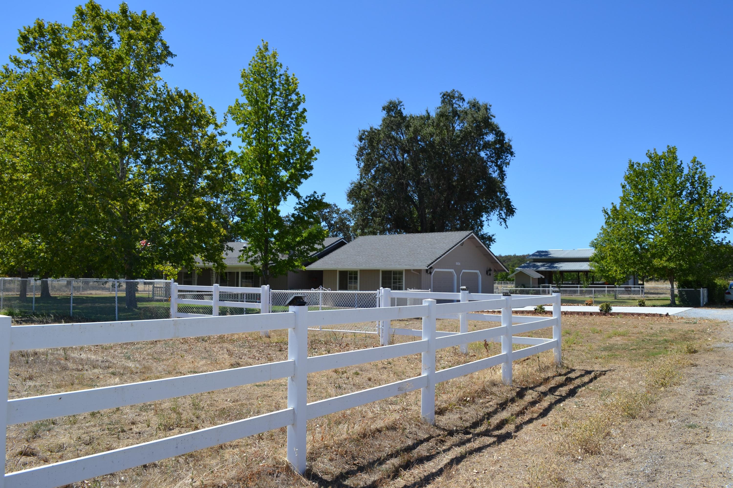 8634 Deschutes Road Palo Cedro, CA 96073 - Photo 24 of 24 Fencing on property/mature trees