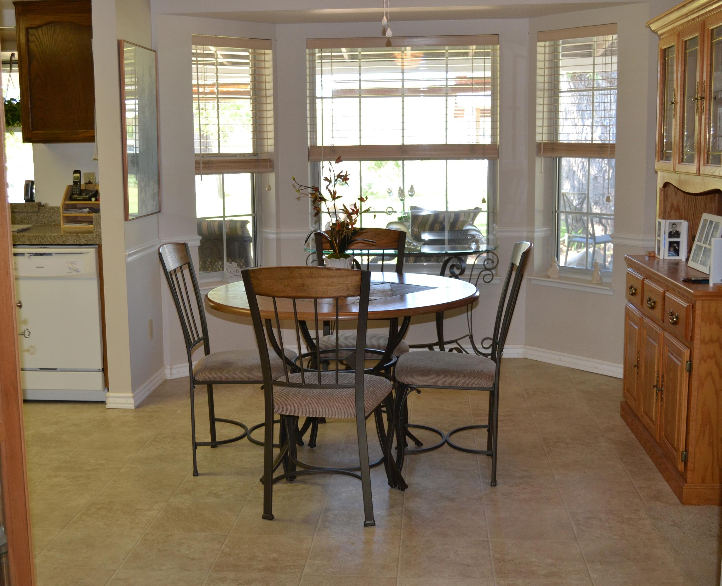 8634 Deschutes Road Palo Cedro, CA 96073 - Photo 4 of 24 Dining area with a bay window-great view