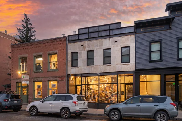 a car parked in front of a building