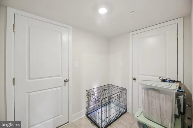 a bedroom with a bed and chair