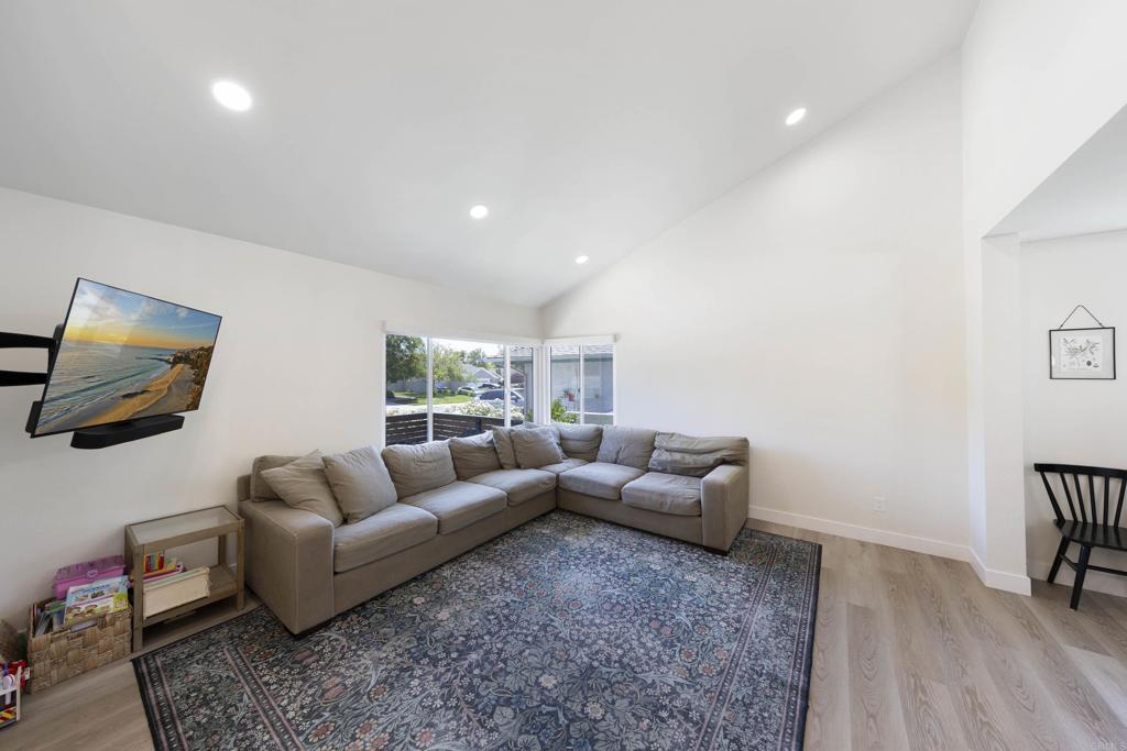 3577 Winslow Road Oceanside, CA 92056 - Photo 6 of 53 a living room with furniture and a flat screen tv