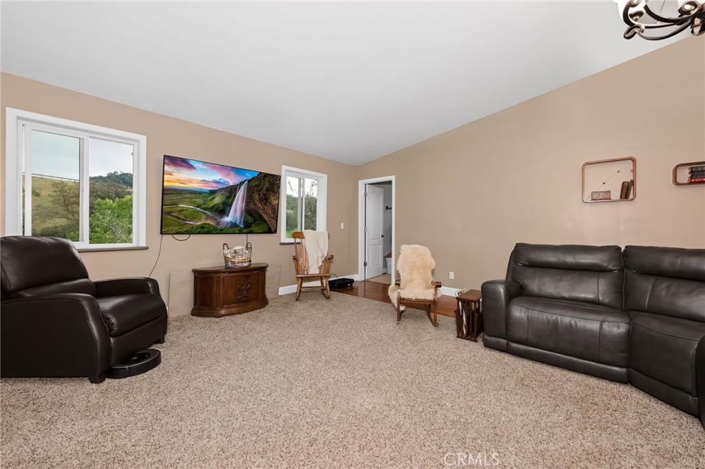 2728 Pentz Road Oroville, CA 95965 - Photo 17 of 52 a living room with furniture and a flat screen tv