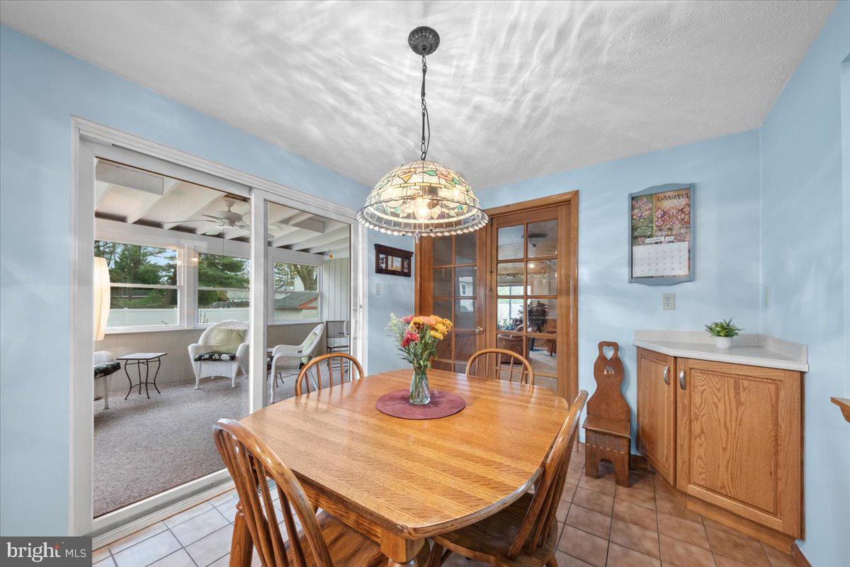 248 Winding Way Marlton, NJ 08053 - Photo 13 of 41 a view of a dining room with furniture window and outside view