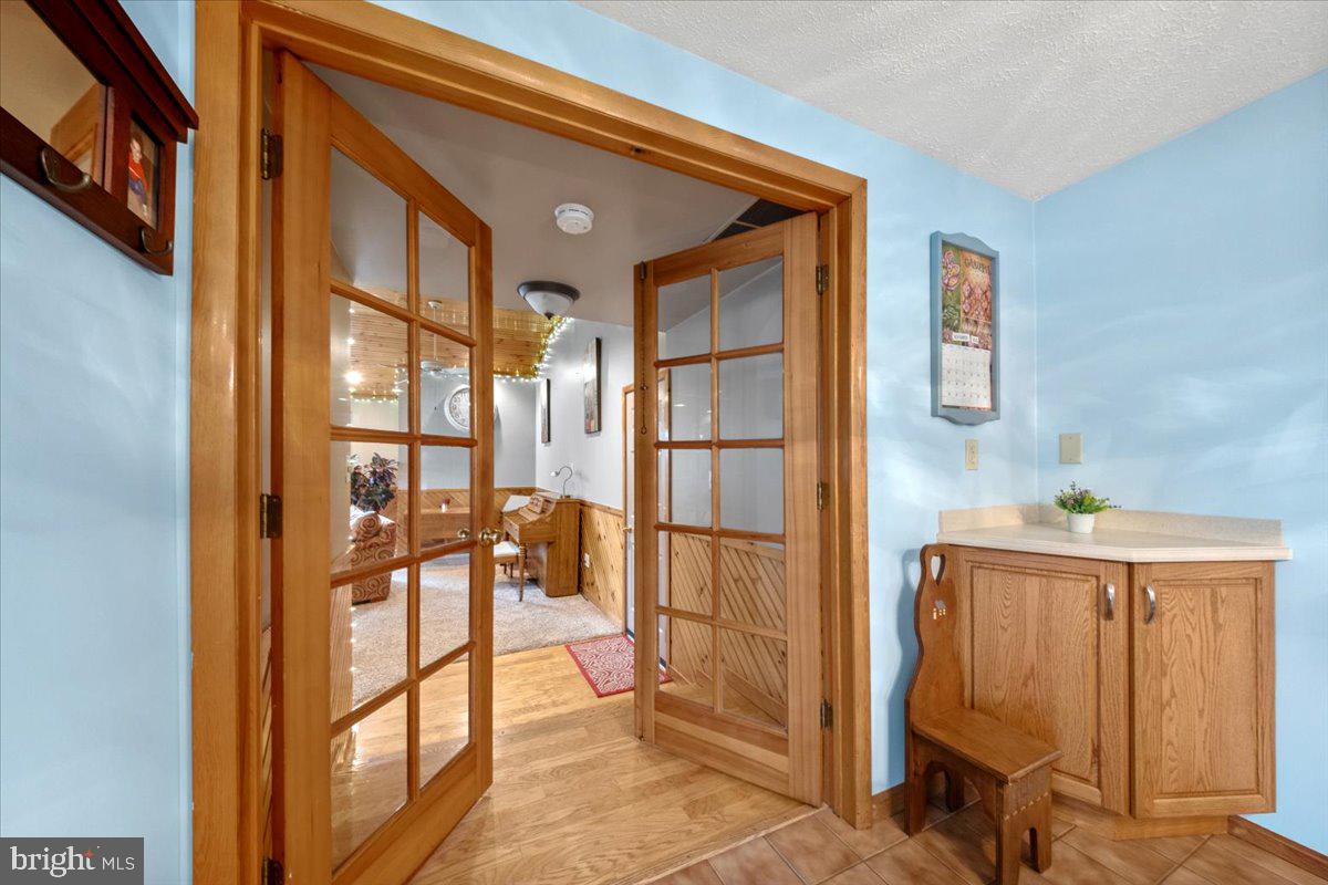 248 Winding Way Marlton, NJ 08053 - Photo 14 of 41 a very nice looking room with a large window and glass door