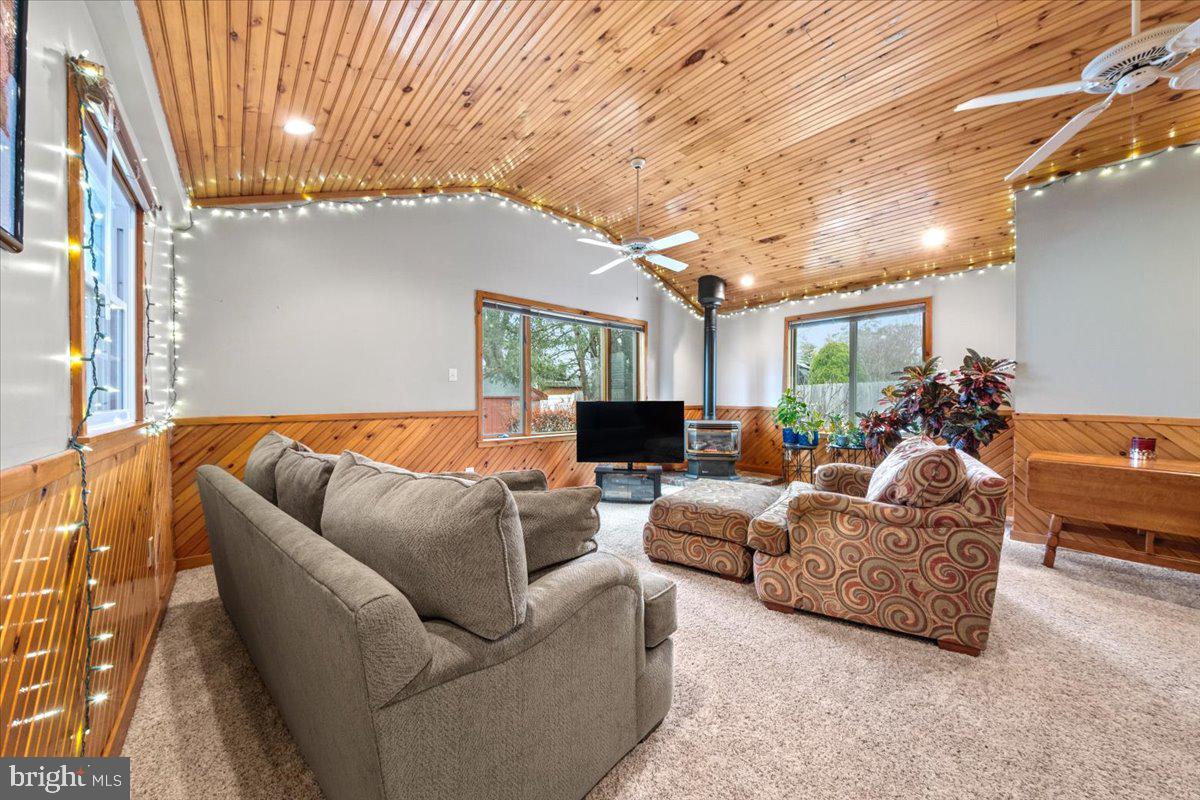 248 Winding Way Marlton, NJ 08053 - Photo 18 of 41 a living room with furniture and a chandelier