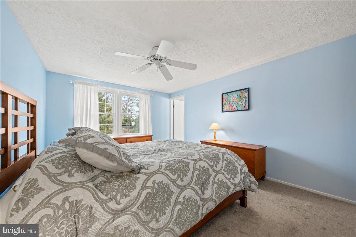 248 Winding Way Marlton, NJ 08053 - Photo 27 of 41 a bedroom with a large bed and a window
