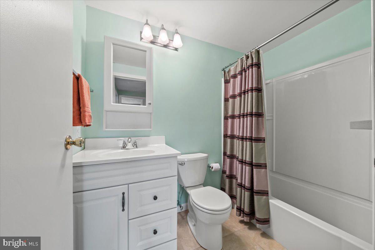 248 Winding Way Marlton, NJ 08053 - Photo 33 of 41 a bathroom with a sink a toilet and shower