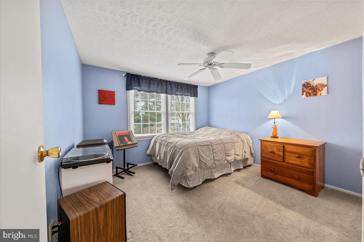 248 Winding Way Marlton, NJ 08053 - Photo 34 of 41 a bedroom with a bed and window